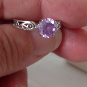 Silver ring with light purple